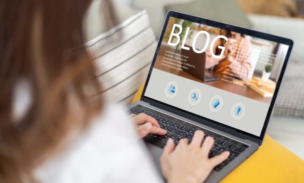 Person adding a blog post to a website
